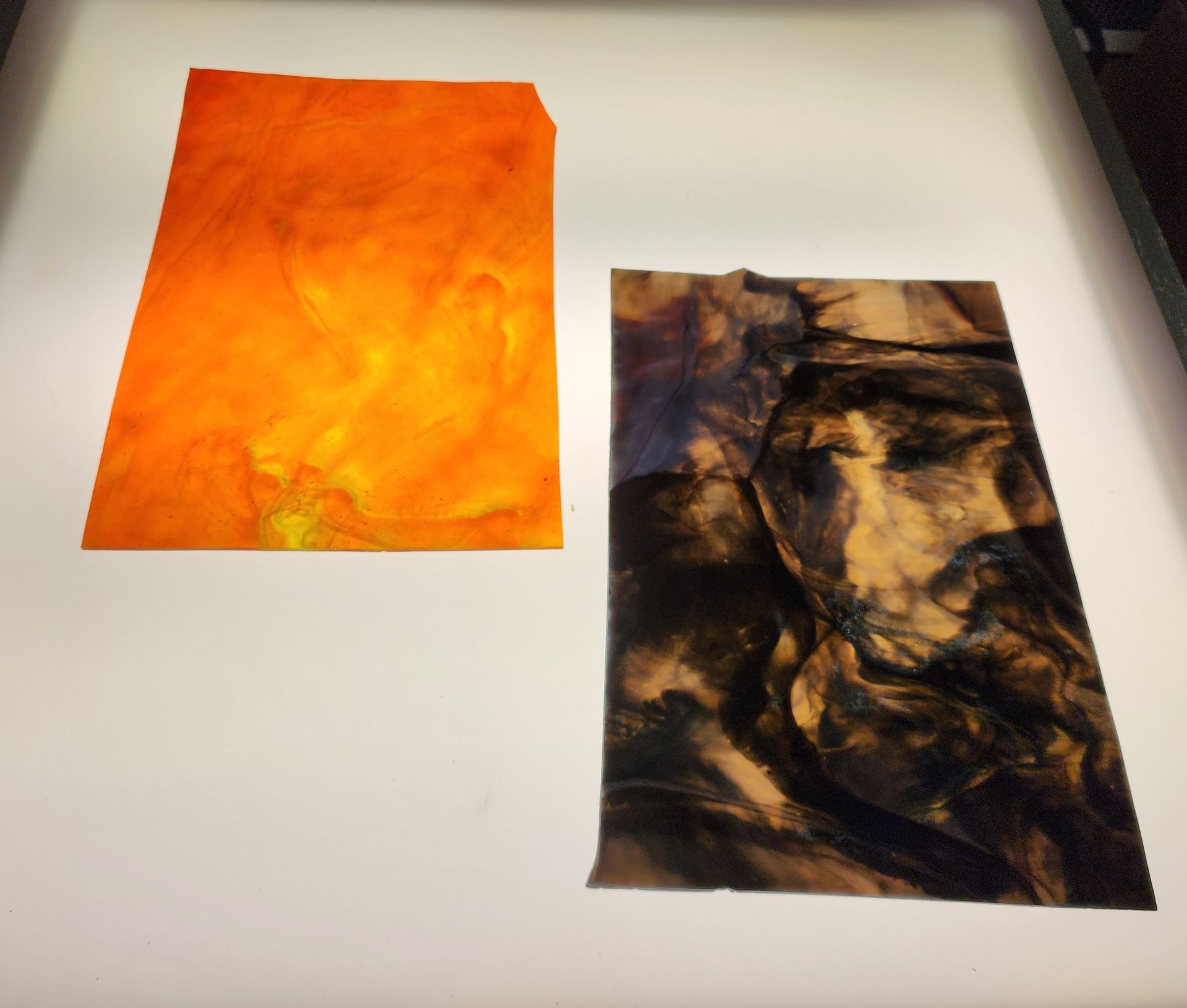 Electric orange Chicago Art Glass and brown swirl glass-stained glass shop Hartford, WI. 