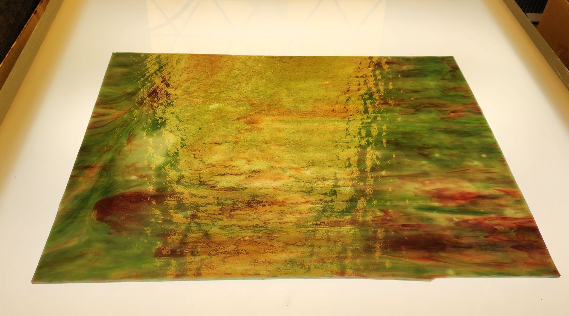 Chicago Art Glass sheet glass in greens, gold and red at Hen Picked Antiques & Stained Glass, Hartford, Wisconsin. 