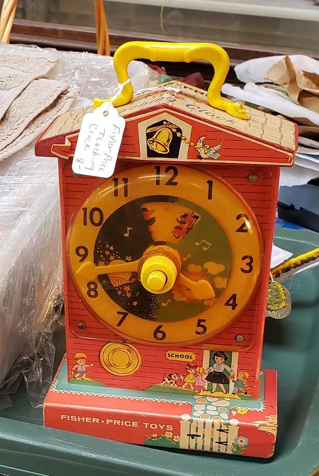Fisher Price Tick Tock Clock vintage wooden lithographed toy winds up and plays music. 
