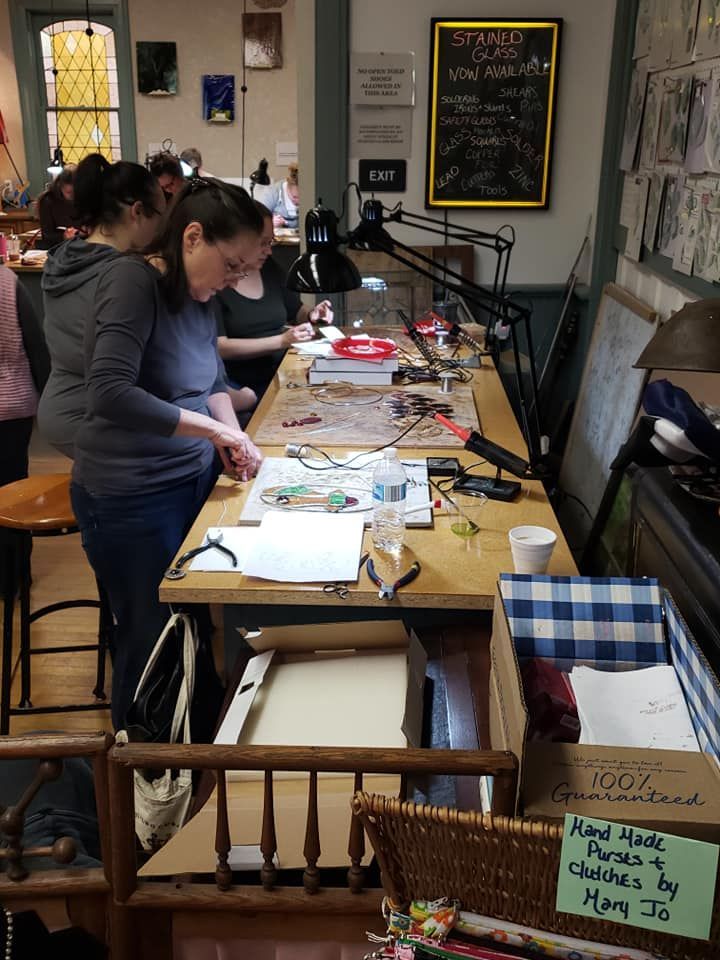 Students working on their stained glass projects at Hen Picked Antiques and Stained Glass. 