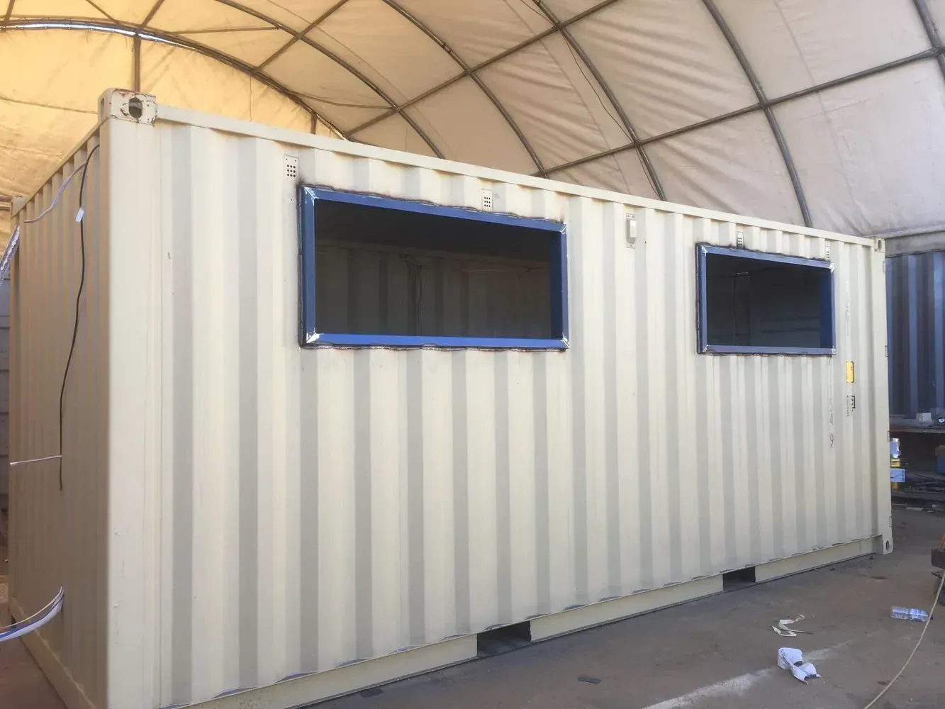 A Tan Shipping Container With Two Windows — East Coast Containers Shipping Containers and Transport in Sunshine Coast, QLD