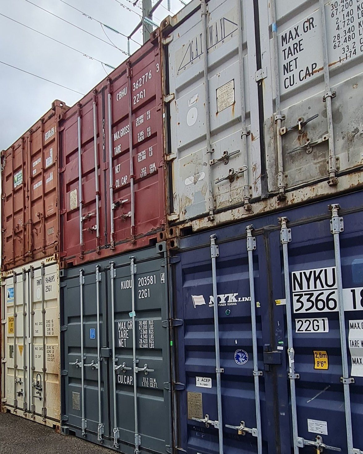 Stack of Colourful Shipping Containers — East Coast Containers Shipping Containers and Transport in Gympie, QLD