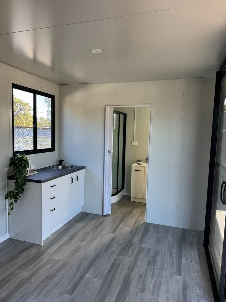 Bright Empty Room With Gray Floors — 6x3 Accommodation Unit