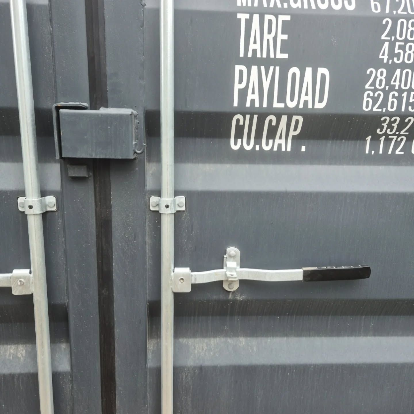 Close-up of a Dark Gray Shipping Container Door — East Coast Containers Shipping Containers and Transport in Gold Coast, QLD
