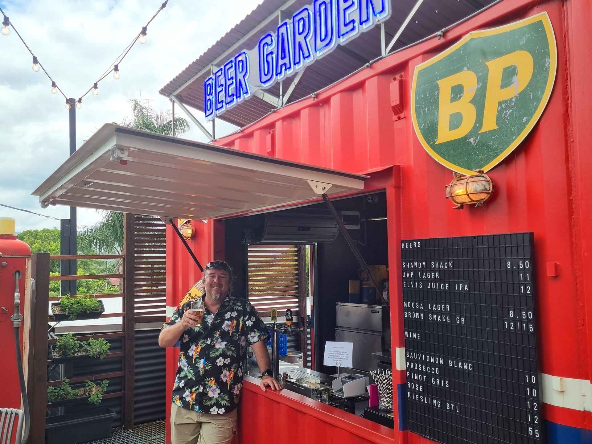 Person at a Red Bp Concession Stand — East Coast Containers Shipping Containers and Transport in Chevallum, QLD