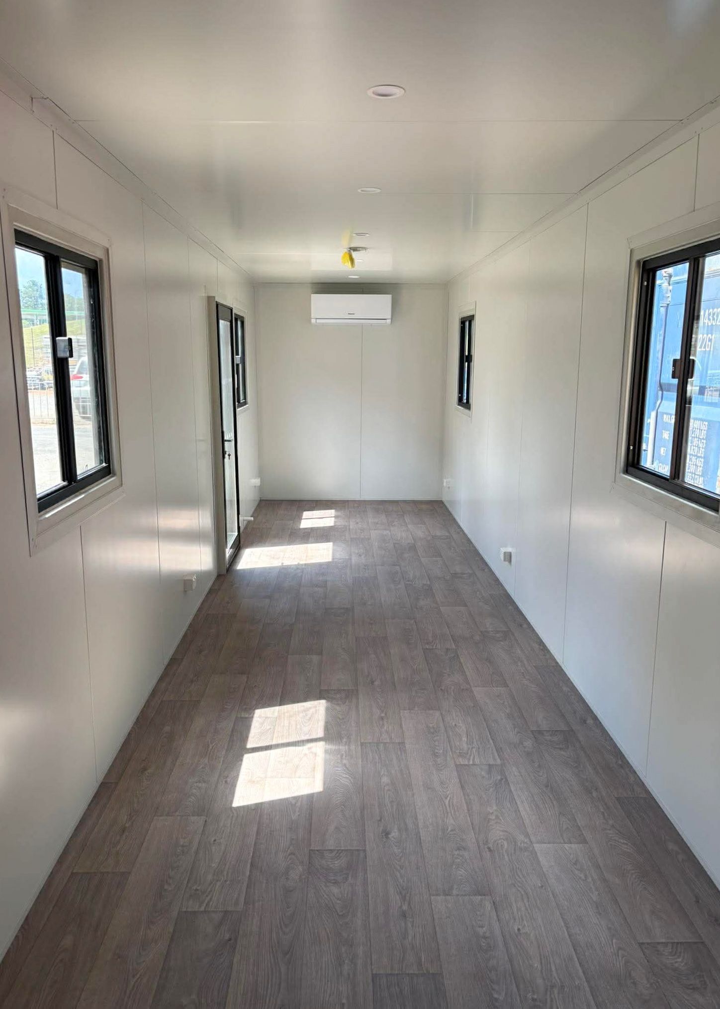 Narrow White Hallway in a Small Trailer — East Coast Containers Shipping Containers and Transport in Chevallum, QLD
