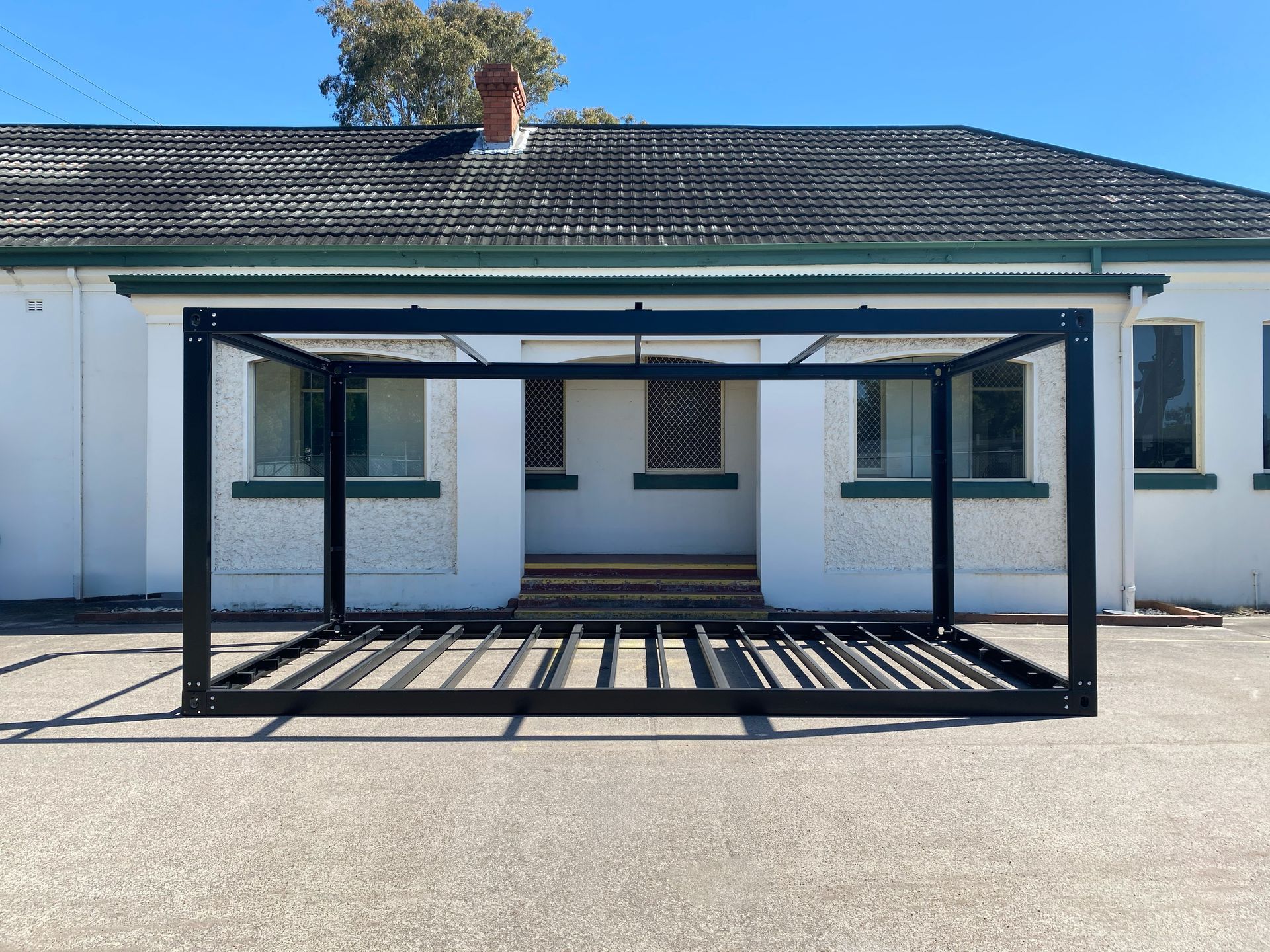 Black Metal Structure — East Coast Containers Shipping Containers and Transport in Chevallum, QLD