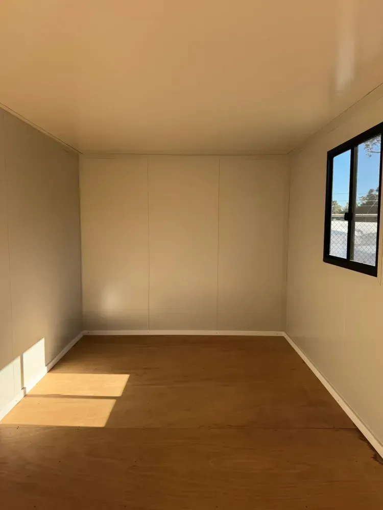 Empty Room With Light-coloured Walls — East Coast Containers Shipping Containers and Transport in Gold Coast, QLD