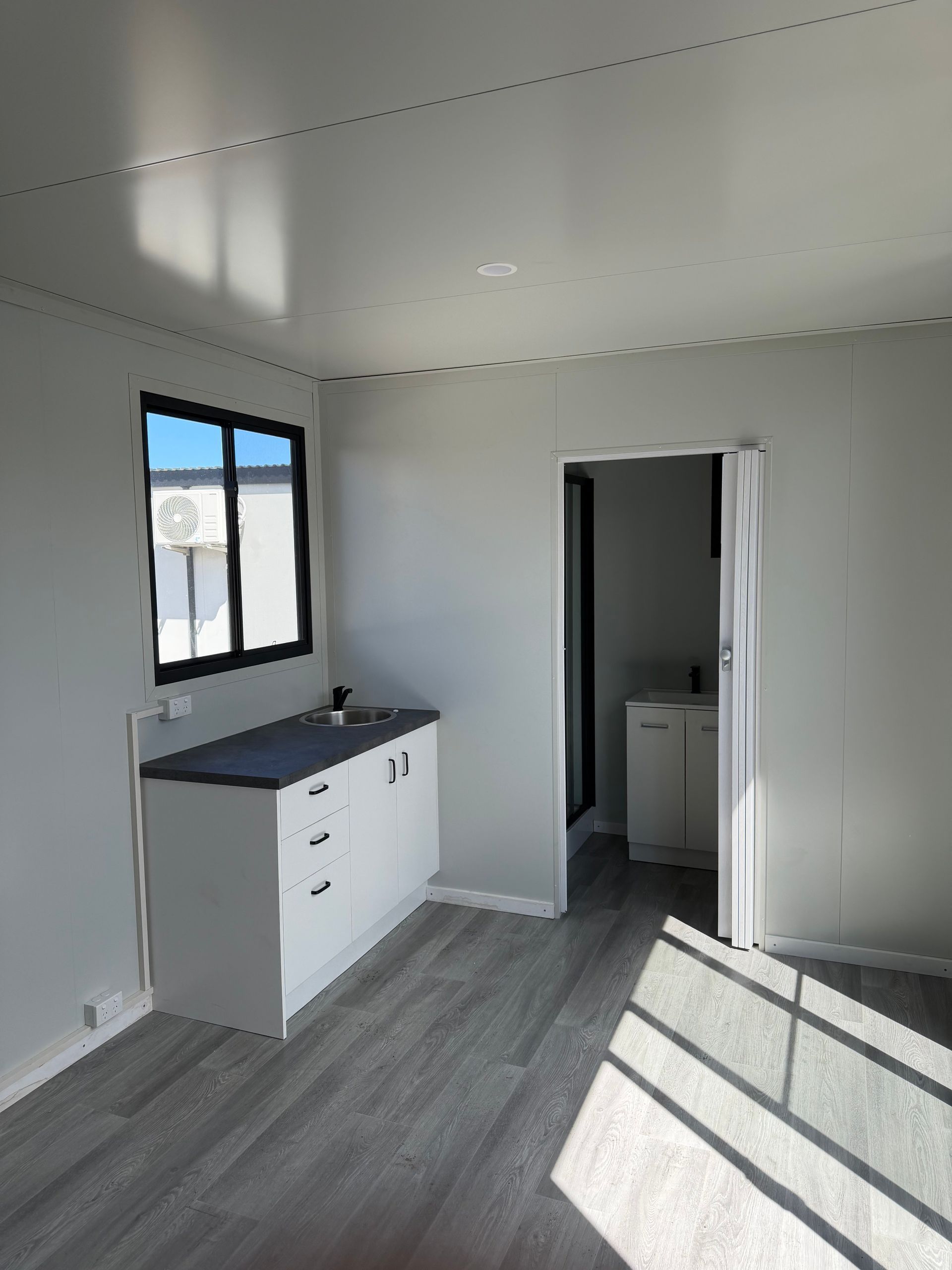 Empty Room With Gray Floor — East Coast Containers Shipping Containers and Transport in Chevallum, QLD
