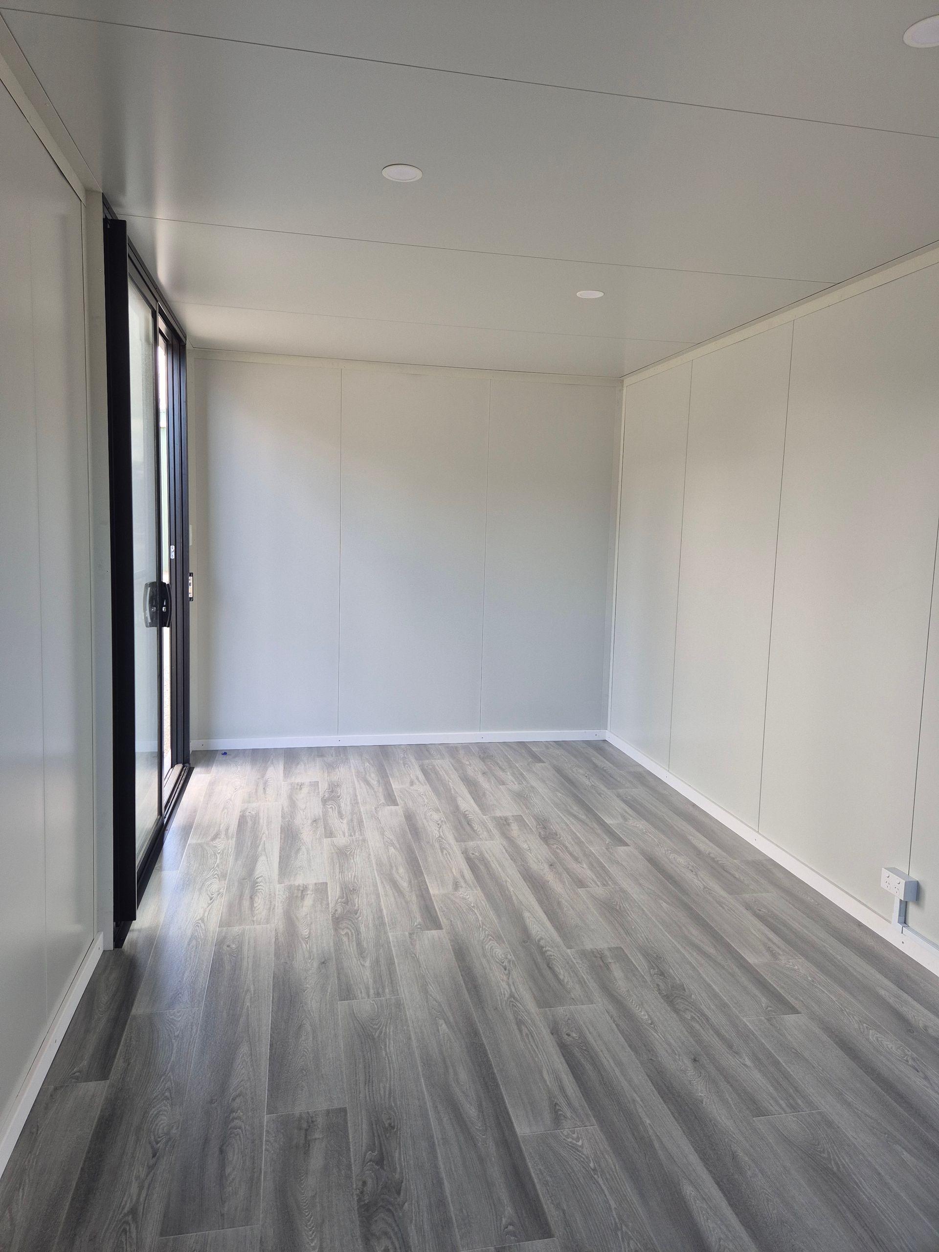 Empty Modern Room With White Walls — East Coast Containers Shipping Containers and Transport in Chevallum, QLD