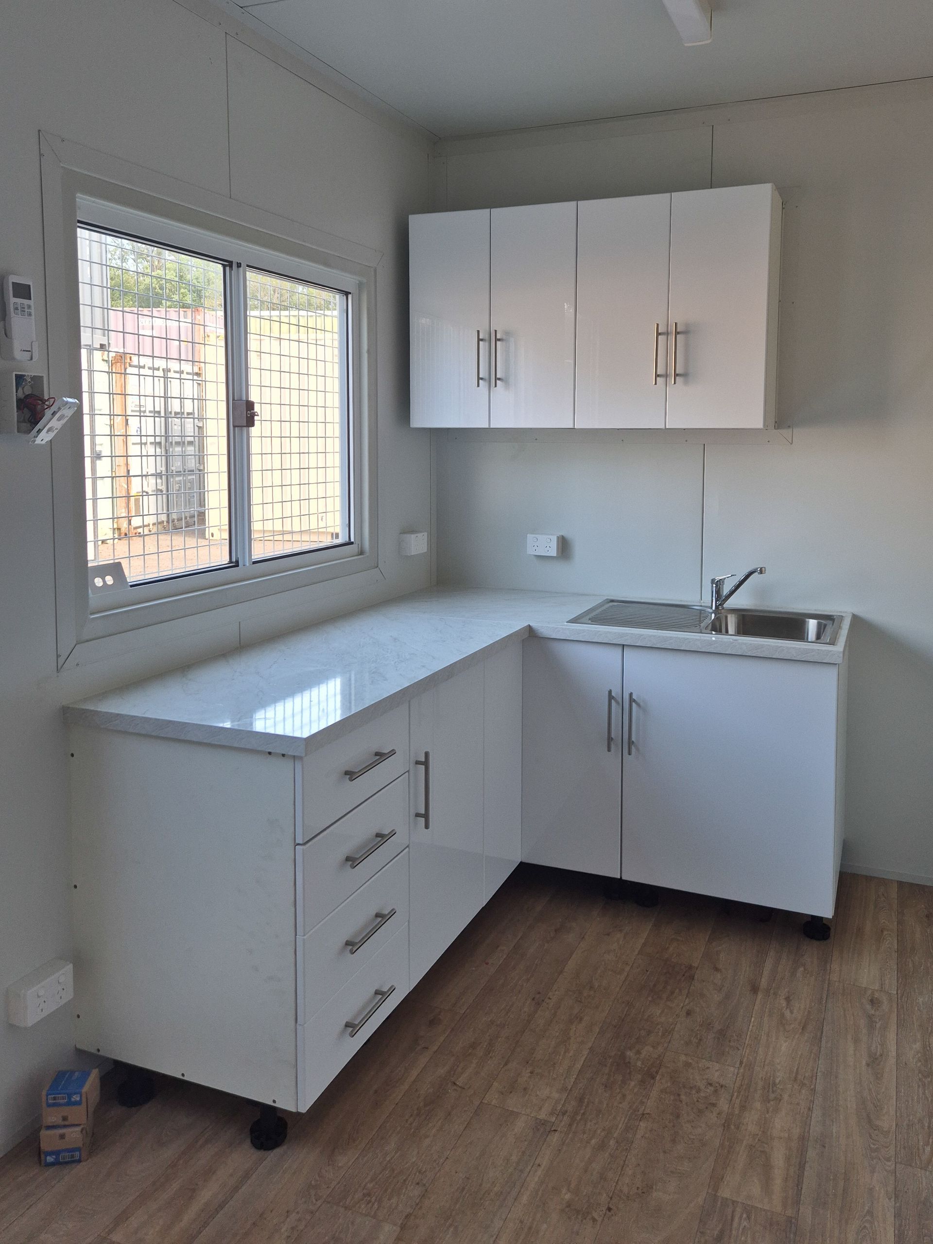 Small White Kitchen — East Coast Containers Shipping Containers and Transport in Chevallum, QLD