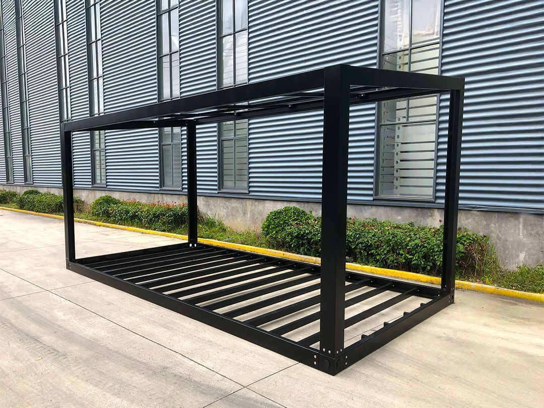 Black Metal Cart on a Concrete Path — East Coast Containers Shipping Containers and Transport in Chevallum, QLD