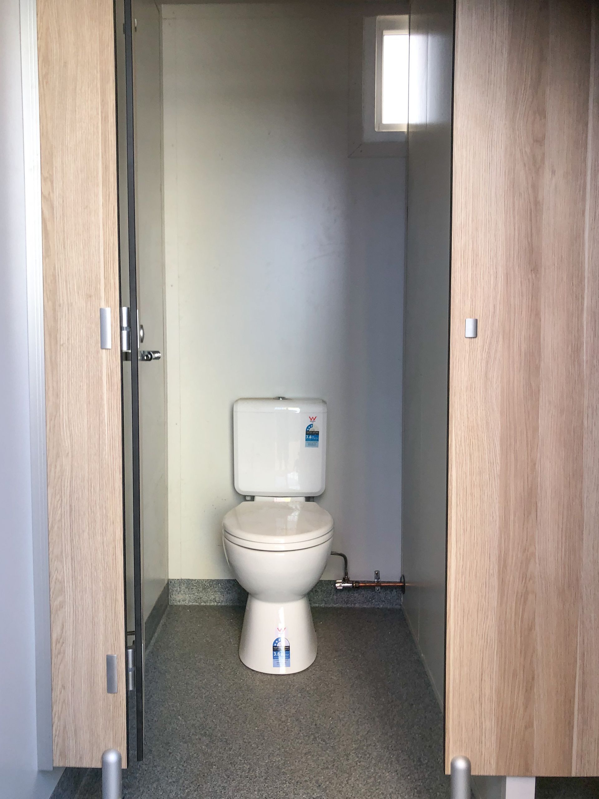 Small Restroom With an Open Toilet — East Coast Containers Shipping Containers and Transport in Chevallum, QLD