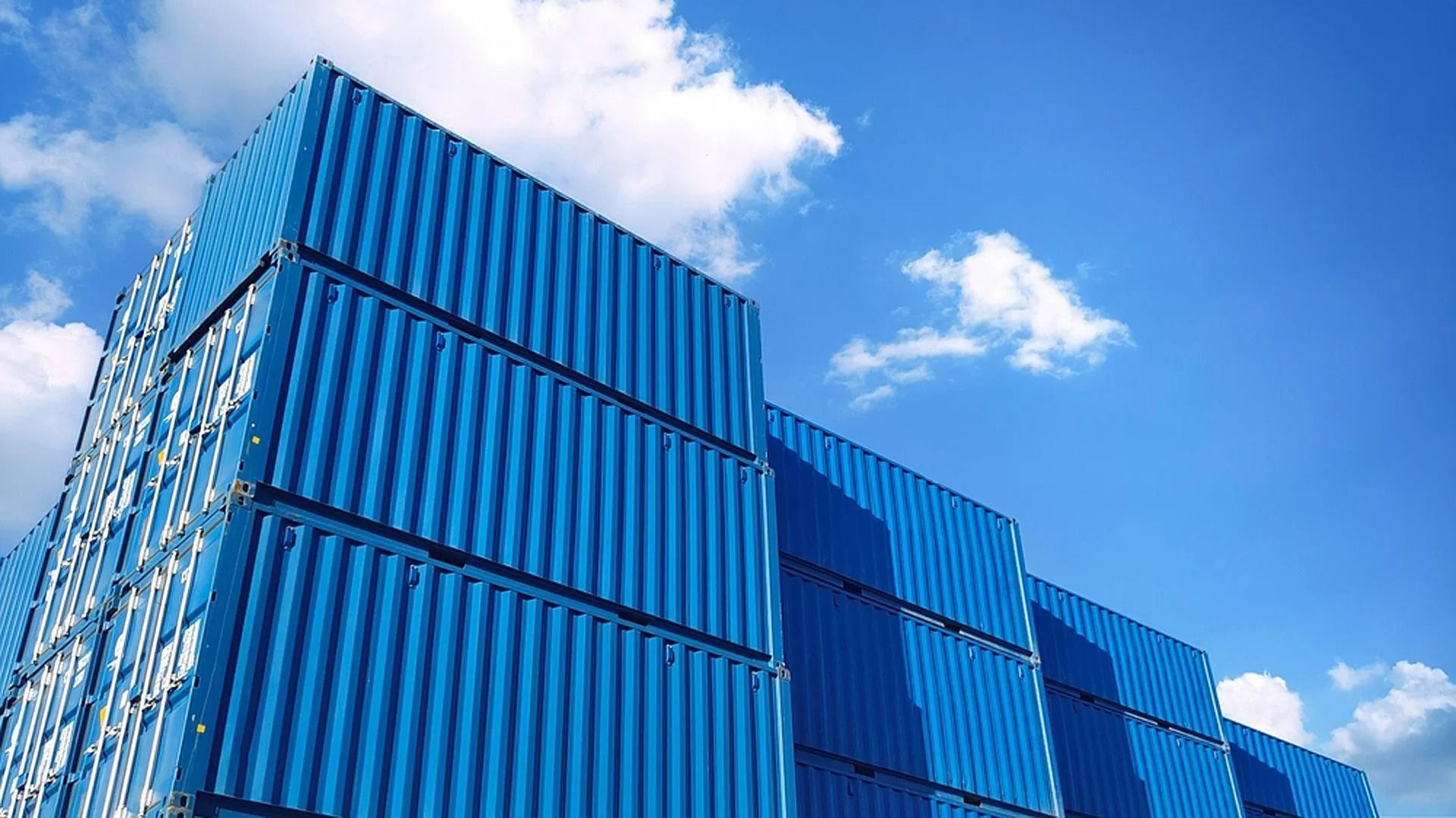 Stacked Blue Shipping Containers — East Coast Containers Shipping Containers and Transport in Chevallum, QLD