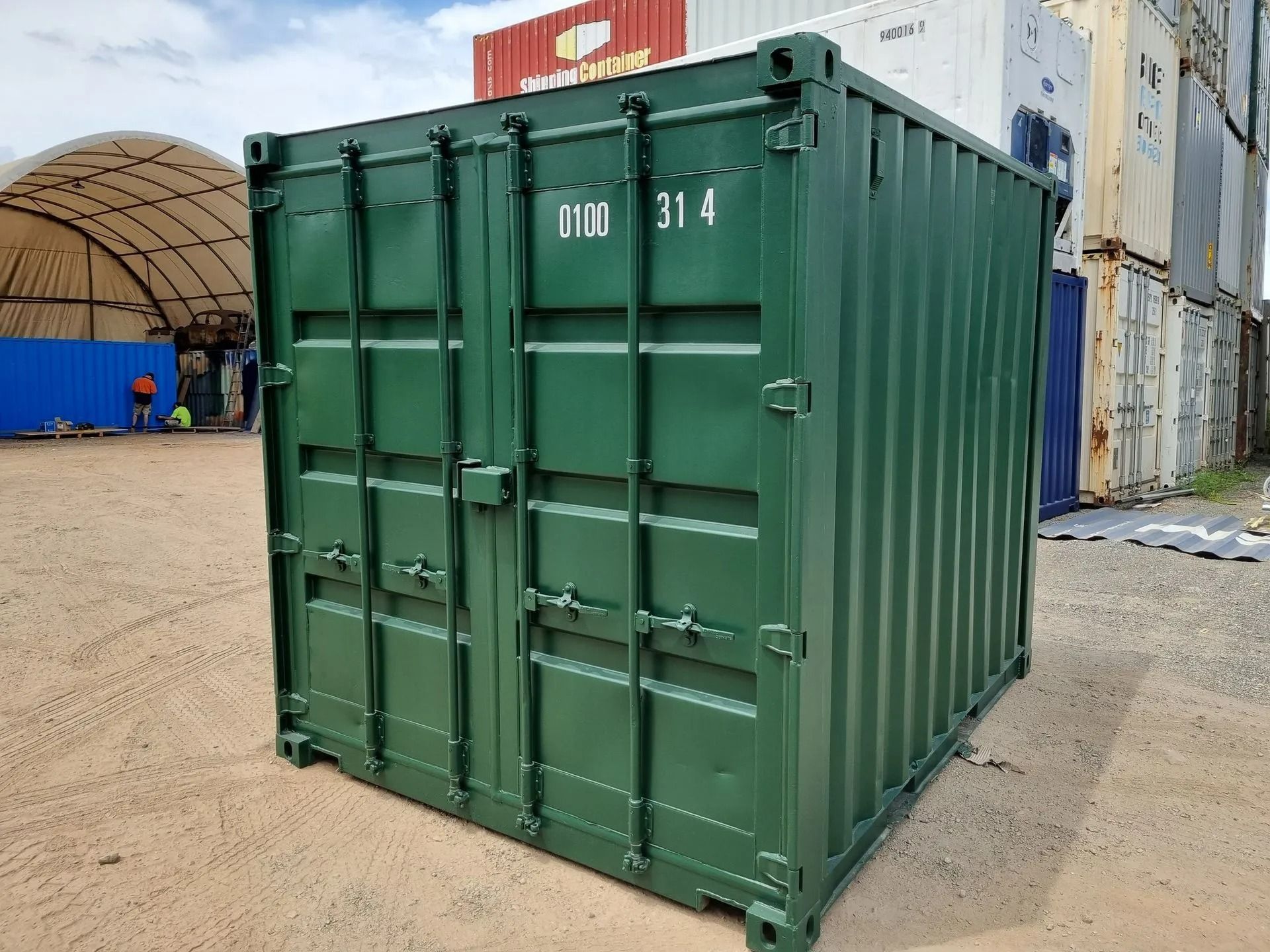 A Small, Dark Green Shipping Container — East Coast Containers Shipping Containers and Transport in Chevallum, QLD A Small, Dark Green Shipping Container — East Coast Containers Shipping Containers and Transport in Chevallum, QLD