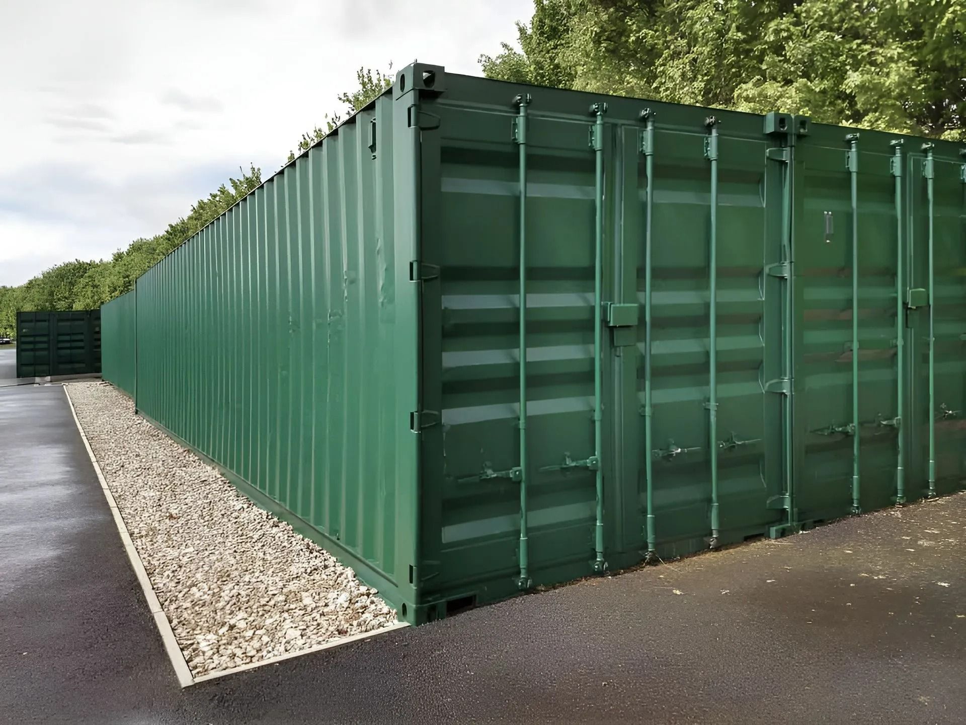 A Row of Dark Green Shipping Containers — East Coast Containers Shipping Containers and Transport in Chevallum, QLD