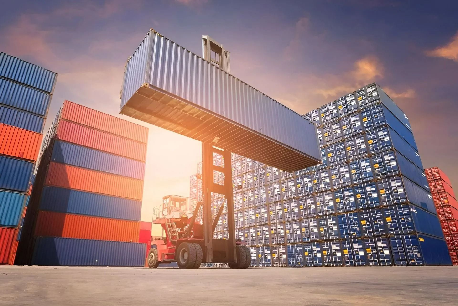 A Reach Stacker Lifts a Shipping Container — East Coast Containers Shipping Containers and Transport in Chevallum, QLD