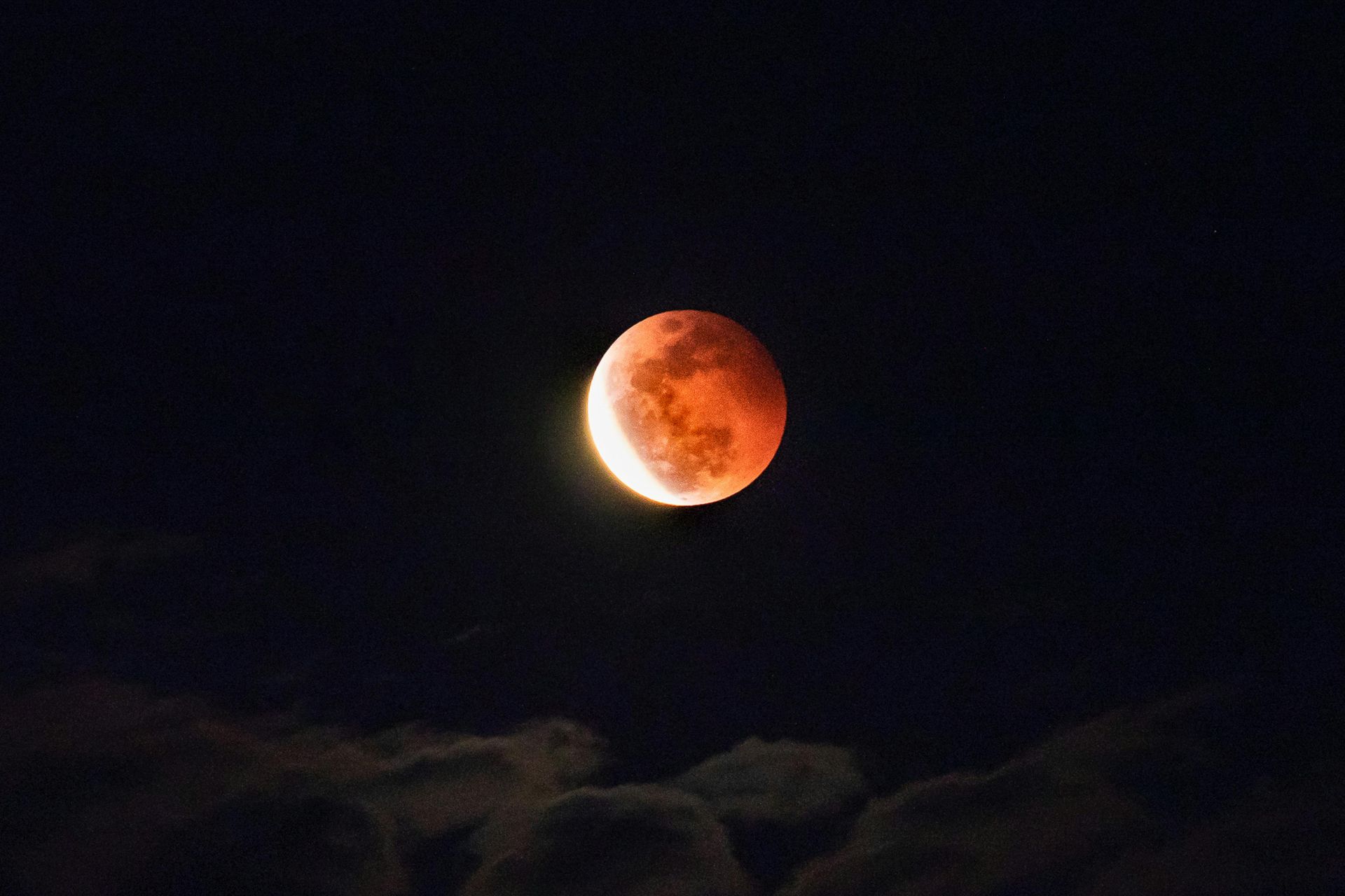 Full moon night sky symbolizing release and integration during lunar wellness sessions