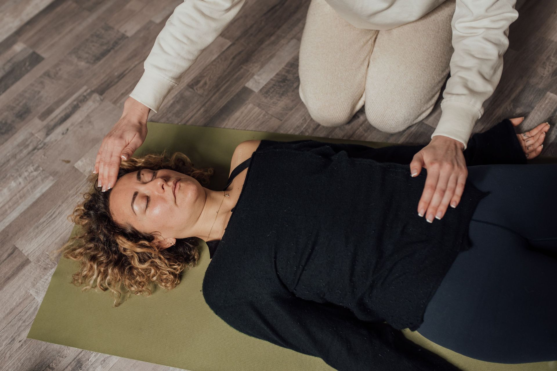 Minimalist wellness space prepared for private Kundalini activation and breathwork session
