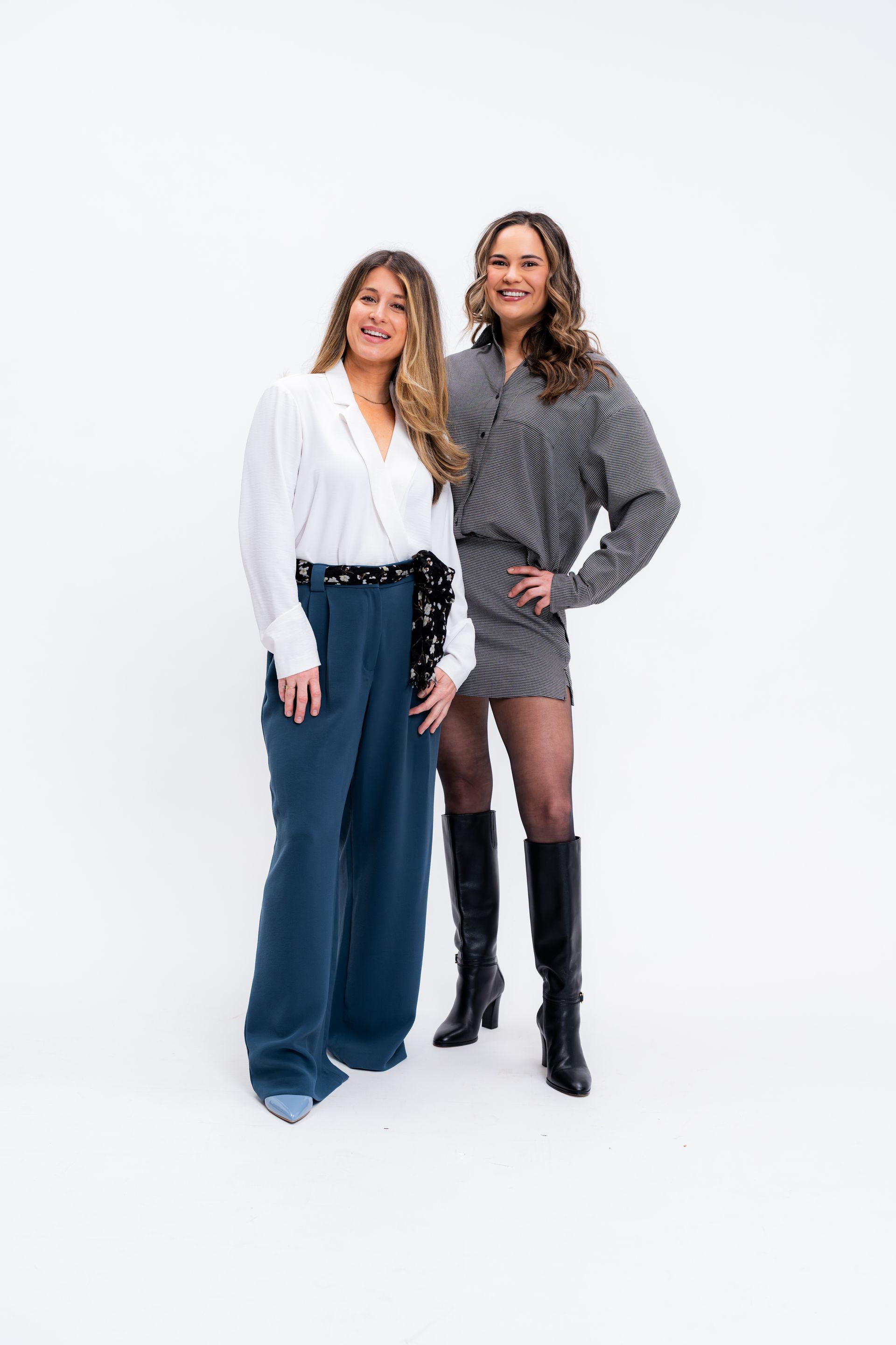 Photographer directing relaxed employee during headshot session