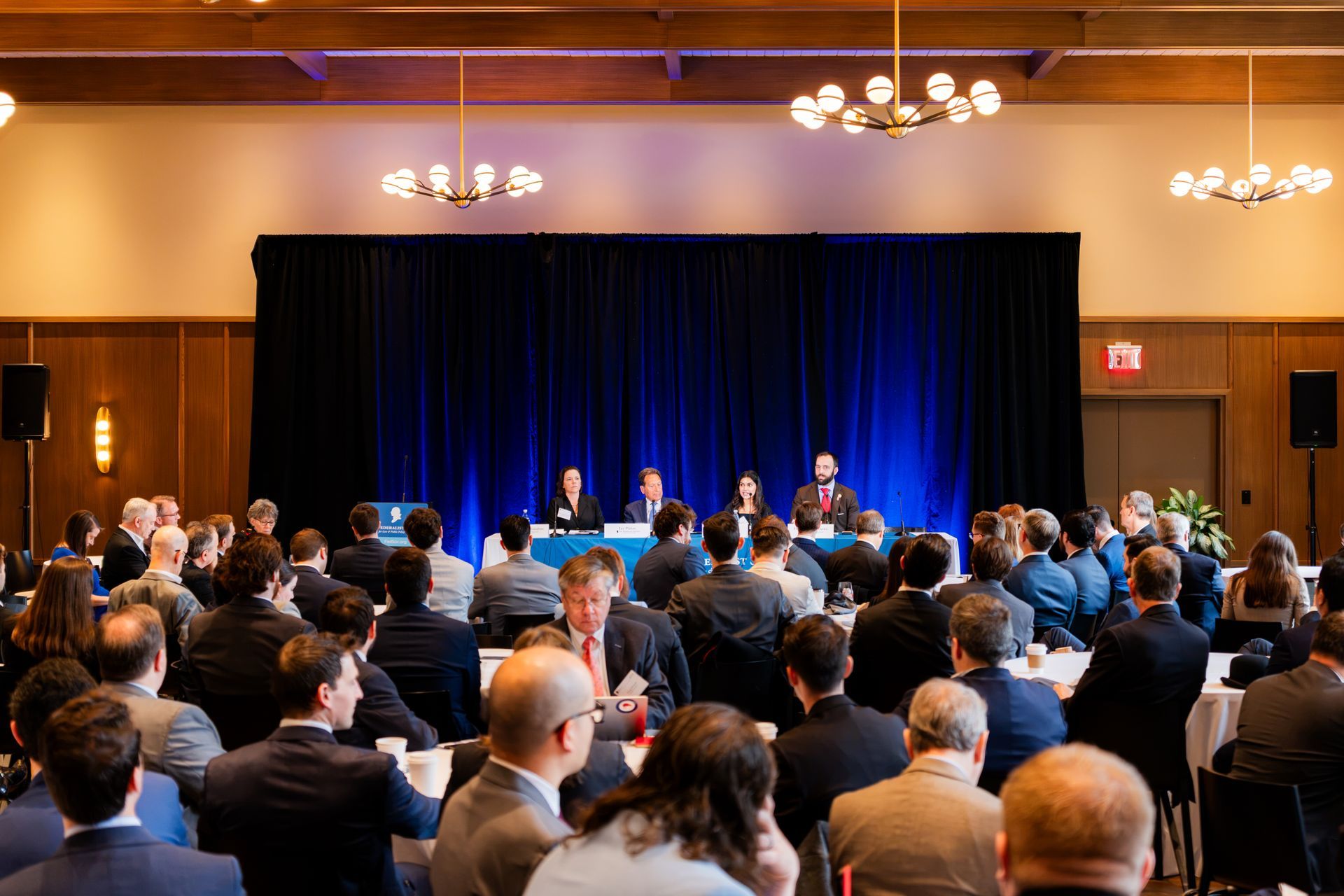 Full room of engaged attendees at corporate conference