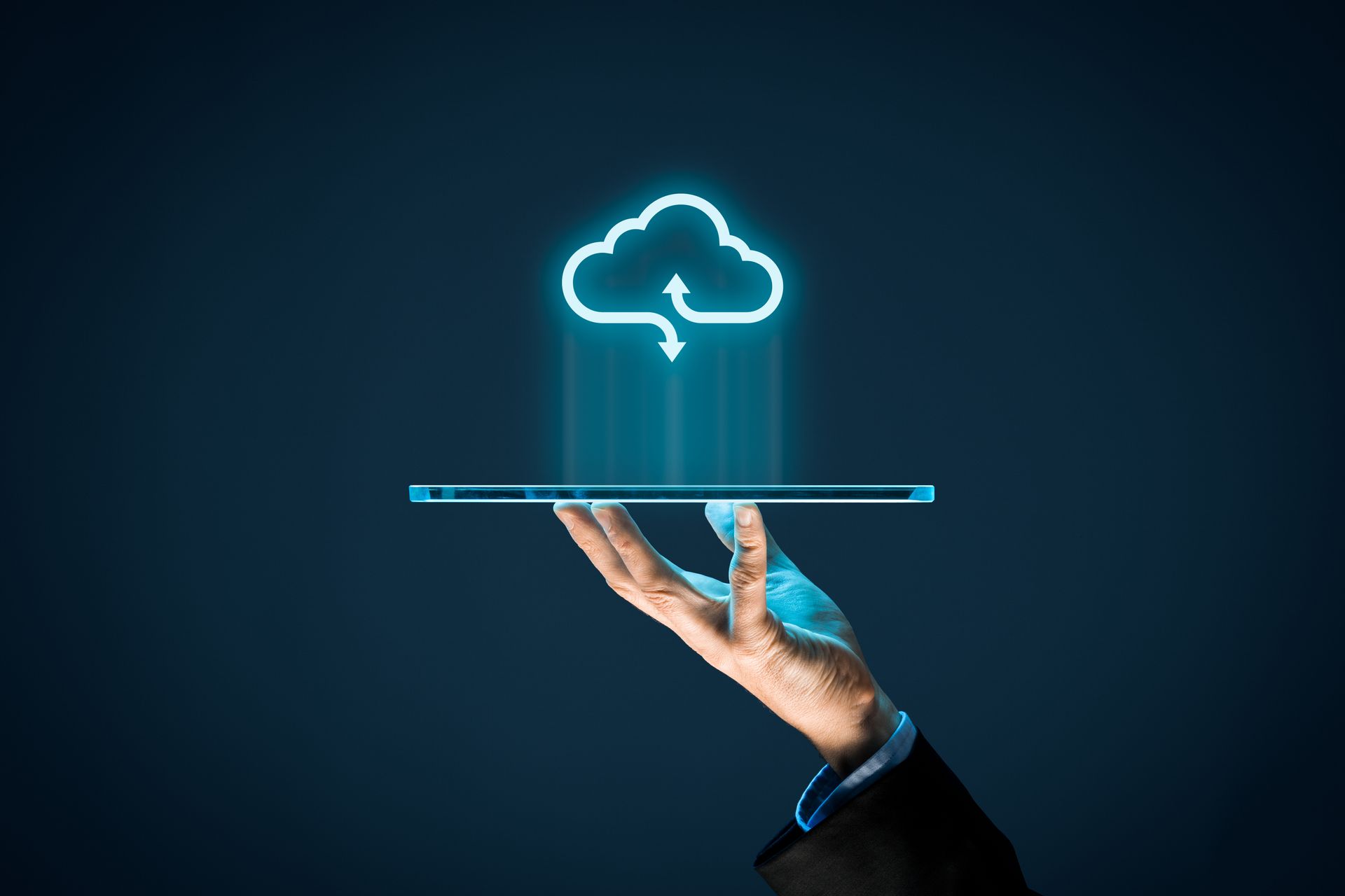 person holding a tablet accessing cloud services
