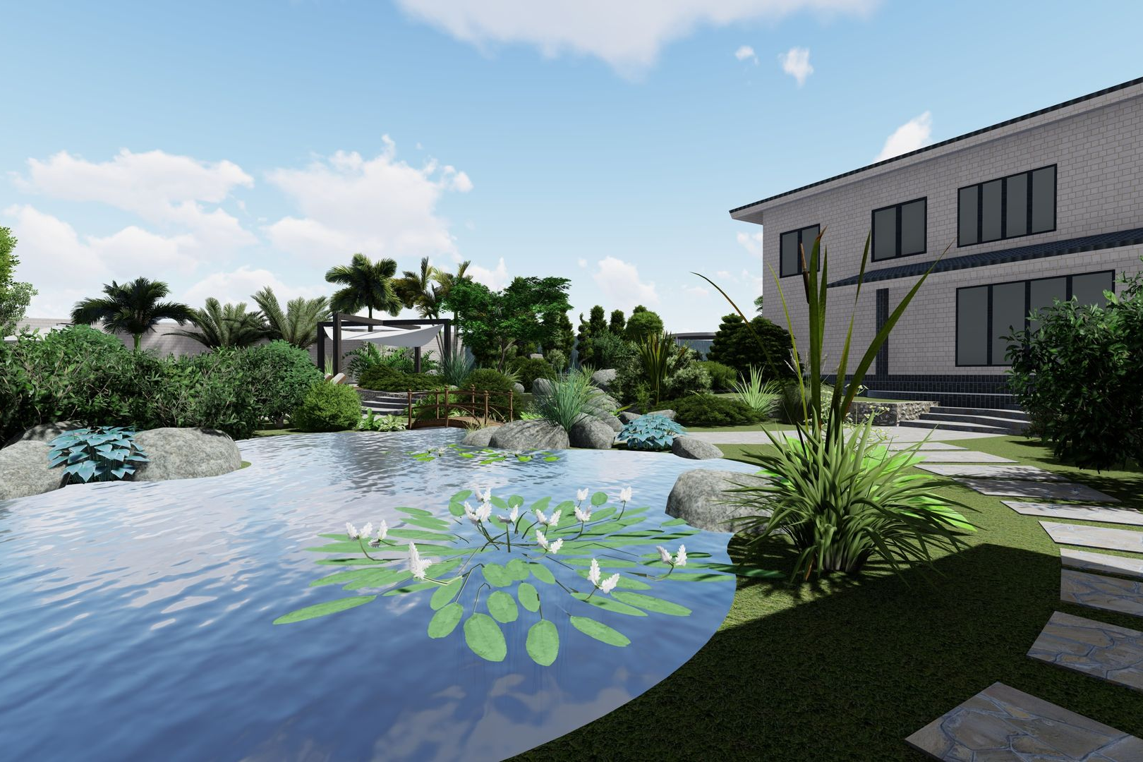 Landscaped backyard with pond, rocks, and house under a blue sky.