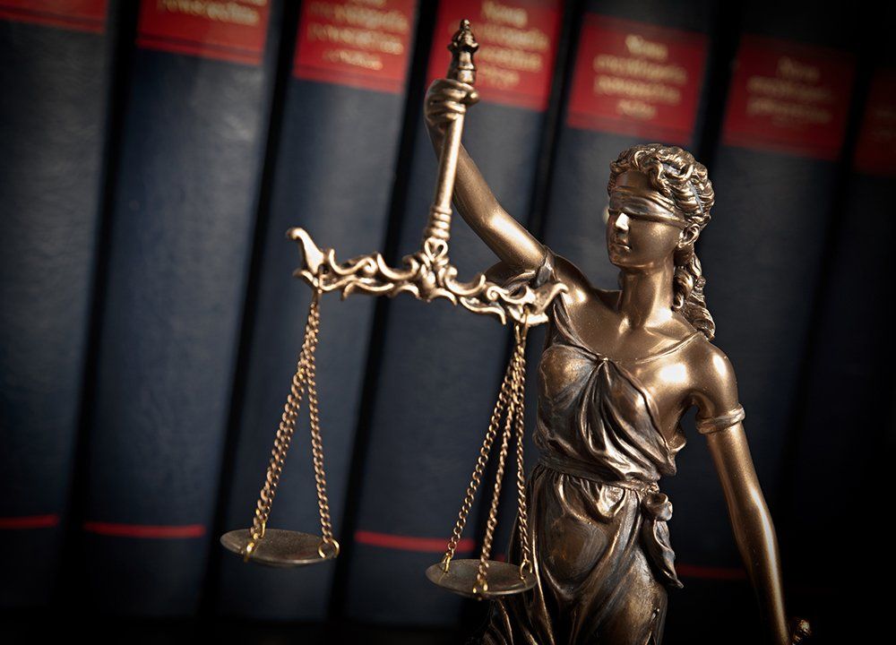 Statue Of Justice And Law Books — Mobile, AL — Richard R. Williams LLC Statue Of Justice And Law Books — Mobile, AL — Richard R. Williams LLC