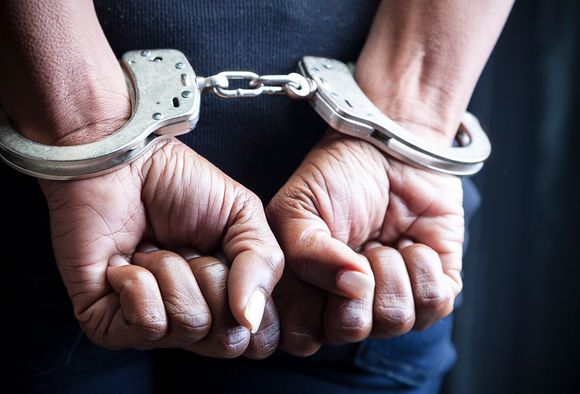Person With Handcuffs — Mobile, AL — Richard R. Williams LLC Person With Handcuffs — Mobile, AL — Richard R. Williams LLC