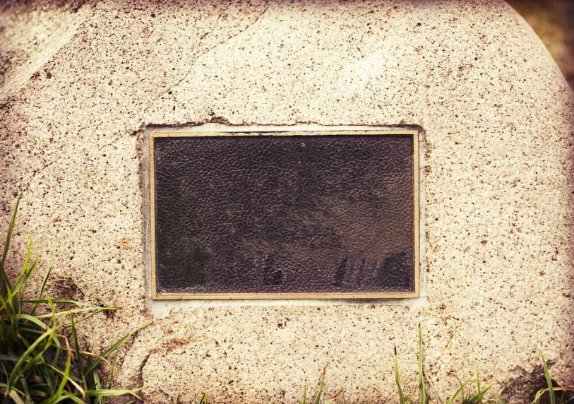 A Gravestone with A Plaque on It in The Grass — Nick Locke Monuments in Nambucca Heads, NSW