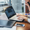 Two women working on new website design choosing