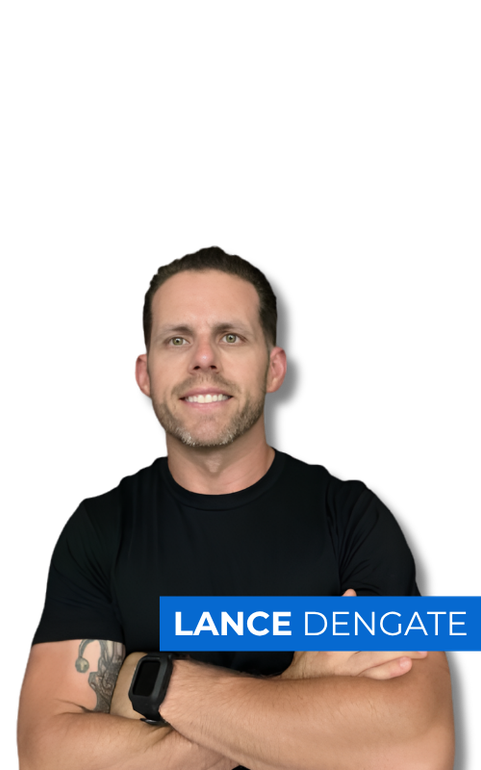 Man in black T-shirt with arms crossed, smiling against a white background