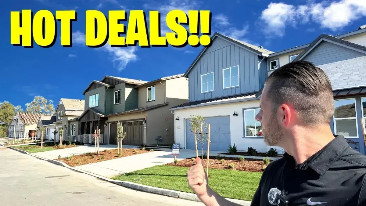Man pointing at suburban houses with bold “HOT DEALS!!” text on a sunny street