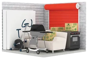 A room with a couch a grill and boxes on the floor