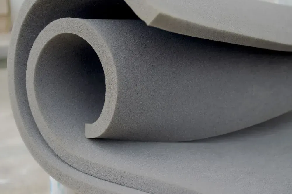 A Close Up of a Roll of Foam Sitting on Top of a Table — F.R.I. Foam & Rubber Industries In Gympie, QLD