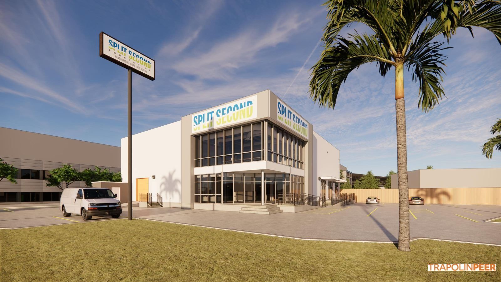 Architectural rendering of the new Split Second center: a two-story white building with glass windows, Split Second signage and accessible ramps