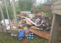 Outdoor junk pile cleared by Takeaway Hauling junk removal St. Louis