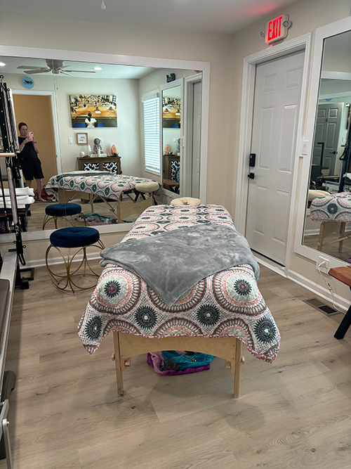 Pilates and Intuitive Energy Healing. massage table