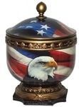 Decorative jar with an American flag lid and a bald eagle on a patriotic red, white, and blue body