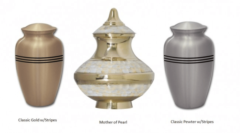 Three decorative urns on white: bronze, gold with pearl accents, and silver.