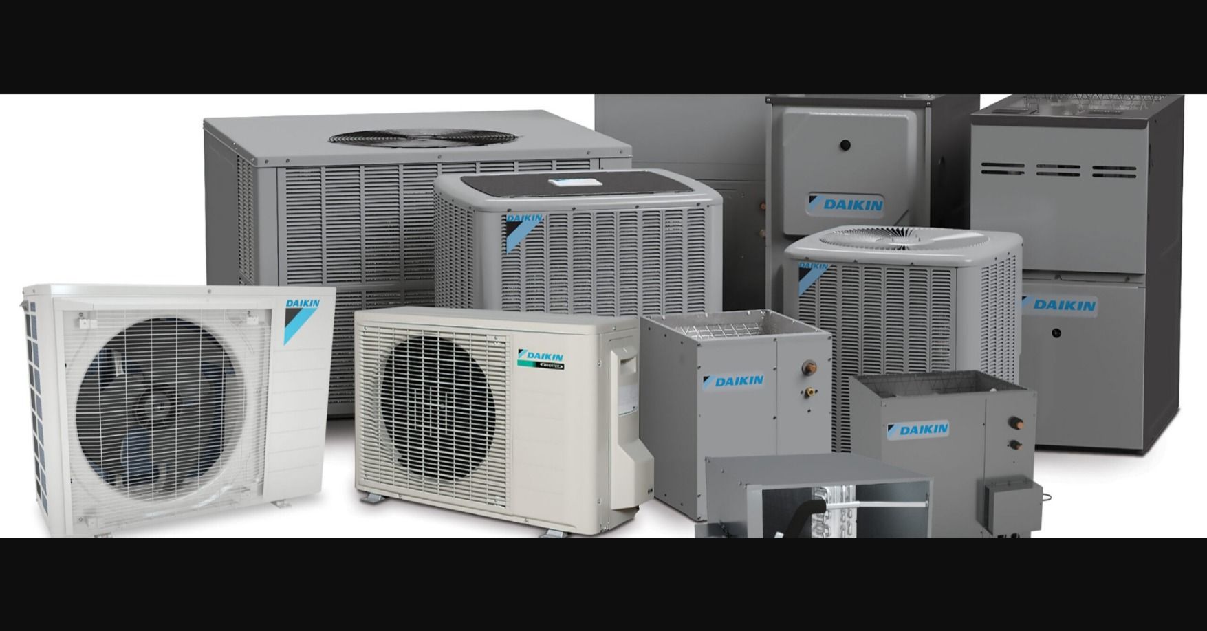 A group of air conditioners and furnaces are sitting next to each other on a white background.