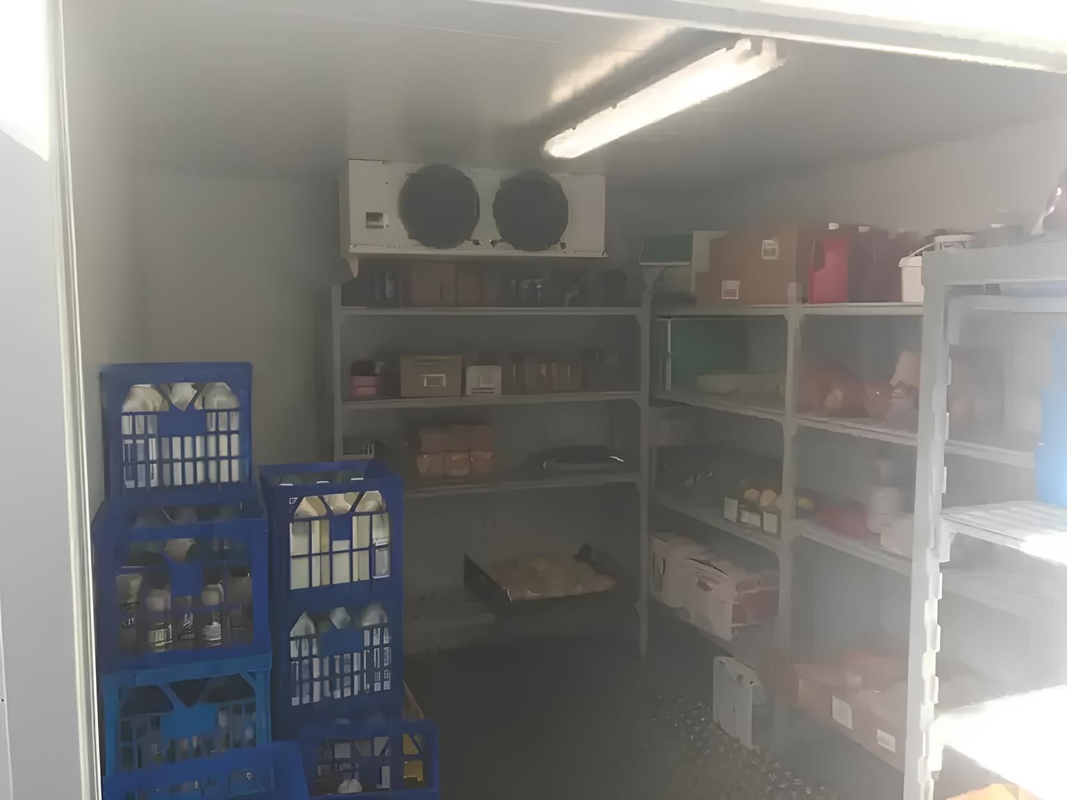 A Room Filled With Shelves and Crates of Food — Todd Hayes Refrigeration & Air Conditioning Pty Ltd in Kyogle, NSW