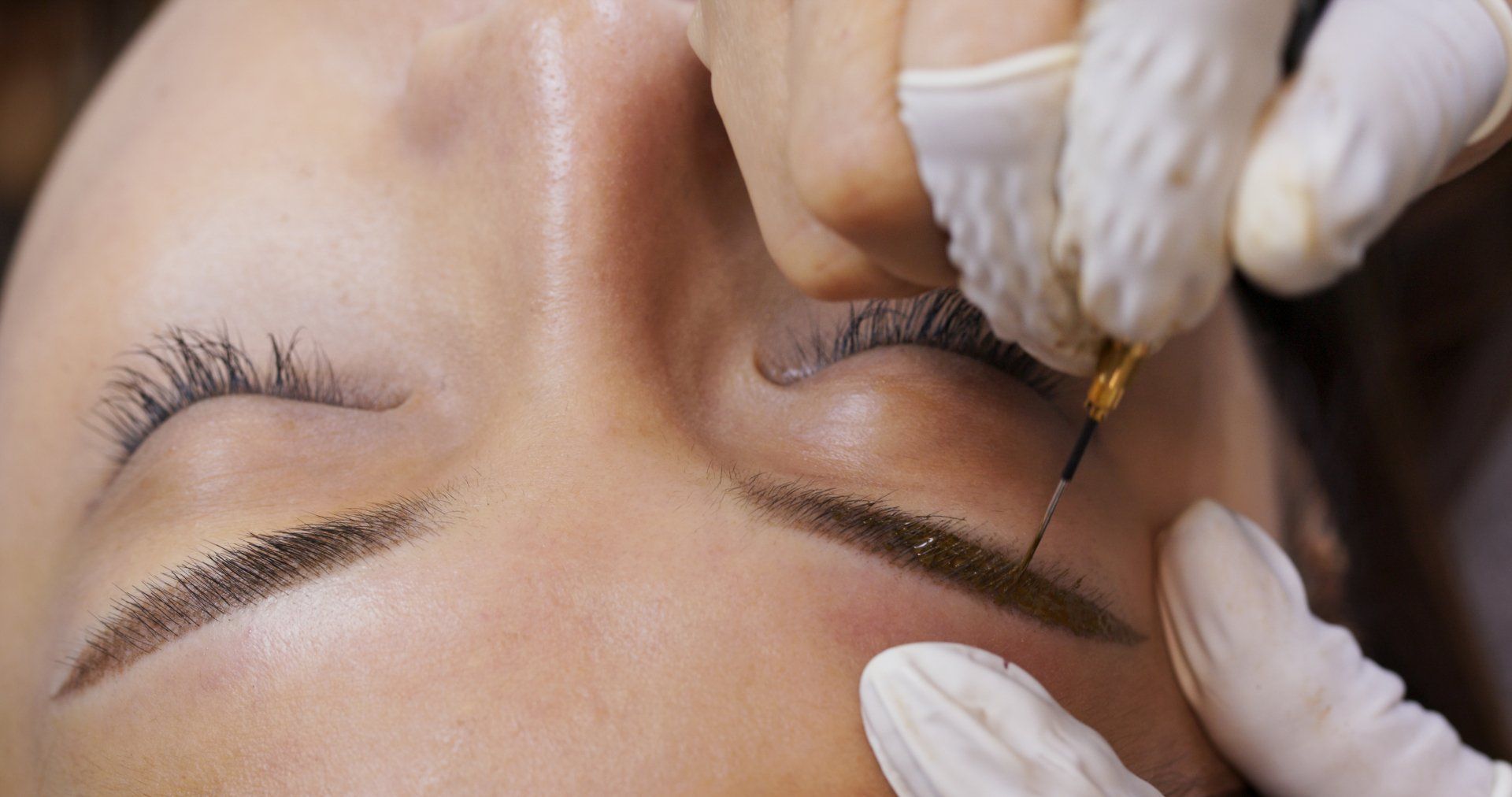 young woman gets facial beauty procedure