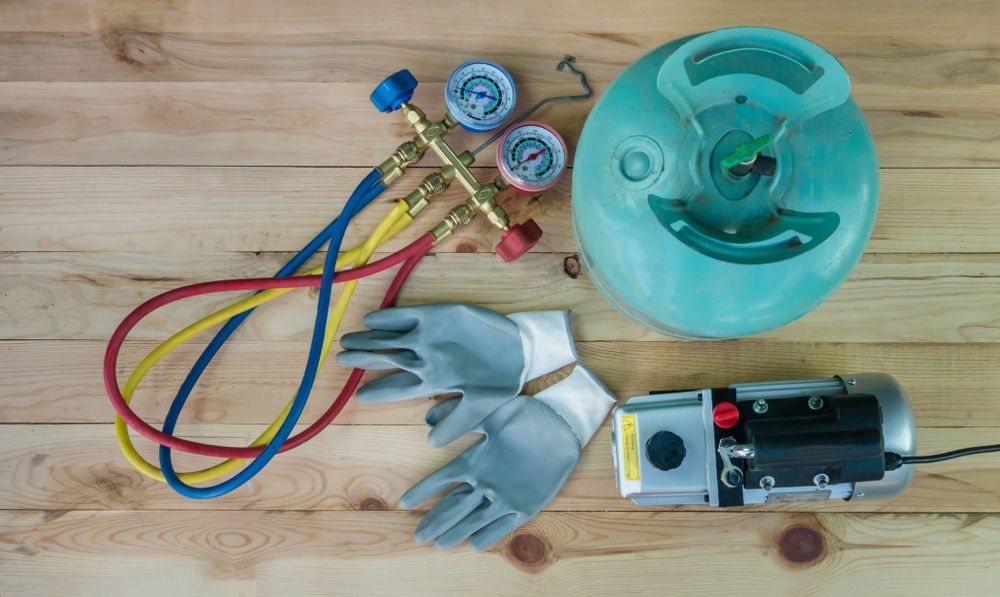 Expert Plumbing Services with Comprehensive Tools, Including Gloves and Gas Fitting Equipment — Town & Country Plumbing Victoria in Greendale, VIC