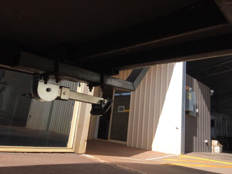 Metal Arm and Pulley Attached to a Building's Awning — Andy's Caravan Repairs in Harristown, QLD