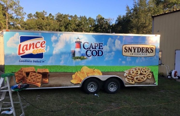 Lance Cape Cod Snyder’s snack trailer with beach-themed graphics parked outdoors