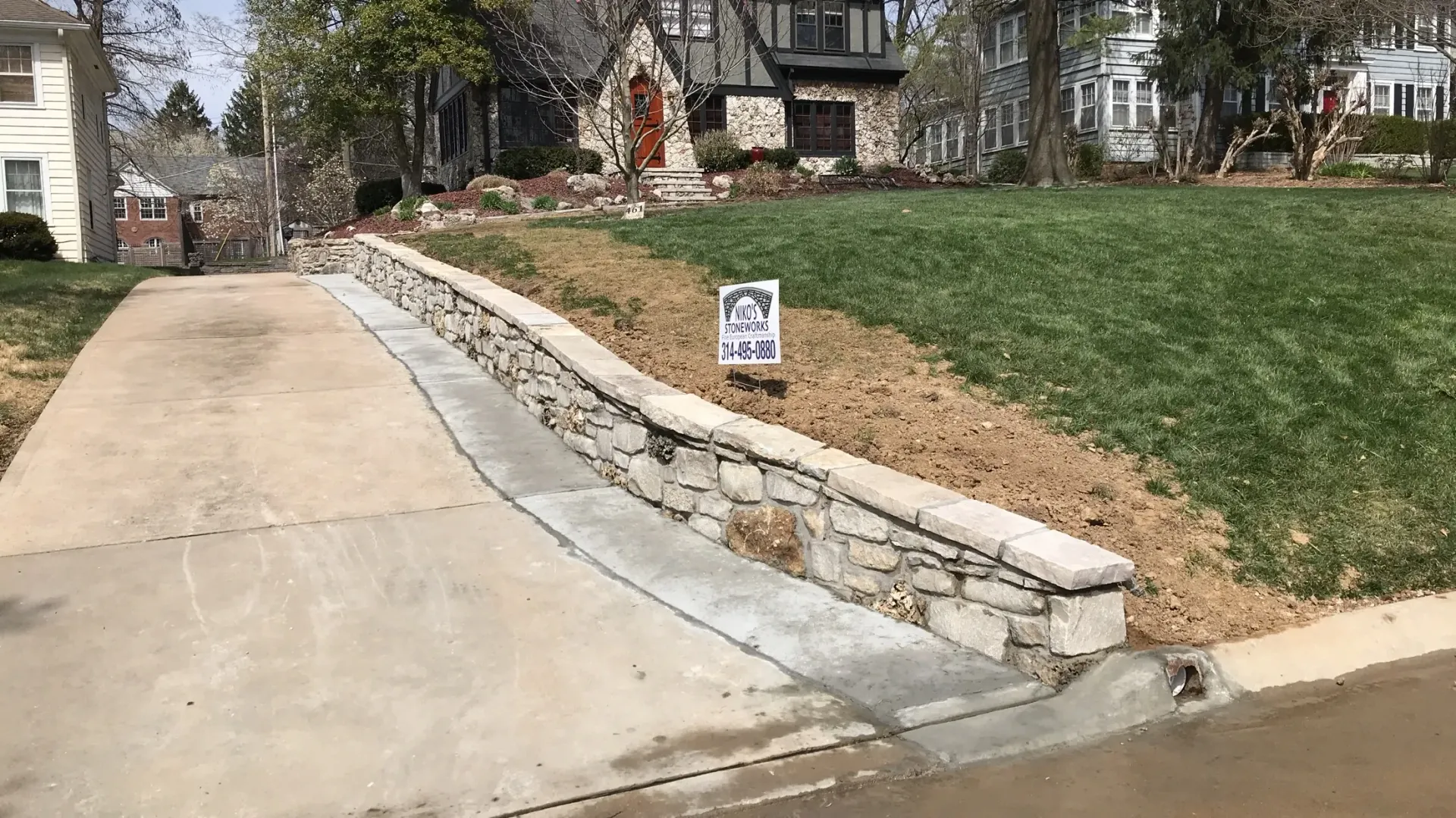 long retaining wall along a driveway in Chesterfield, MO
