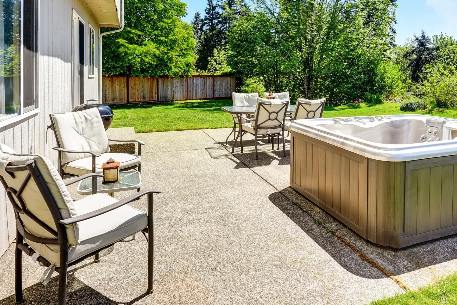Concrete patio with chairs in St. Louis, MO