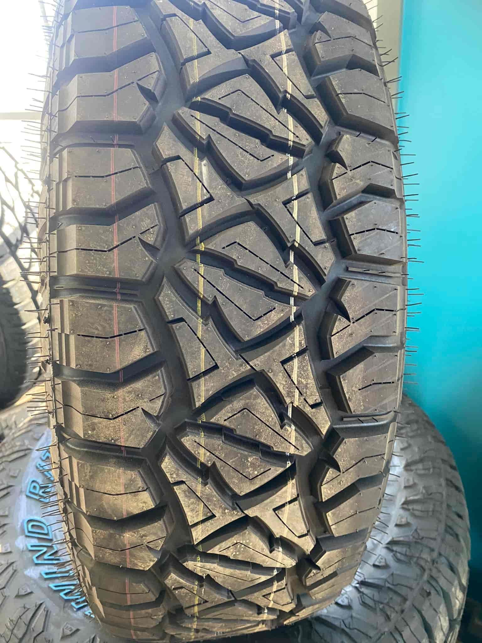 A Close Up of a Tyre Sitting on Top of a Pile of Tyres — ARB Budget Tyres in Delacombe, VIC