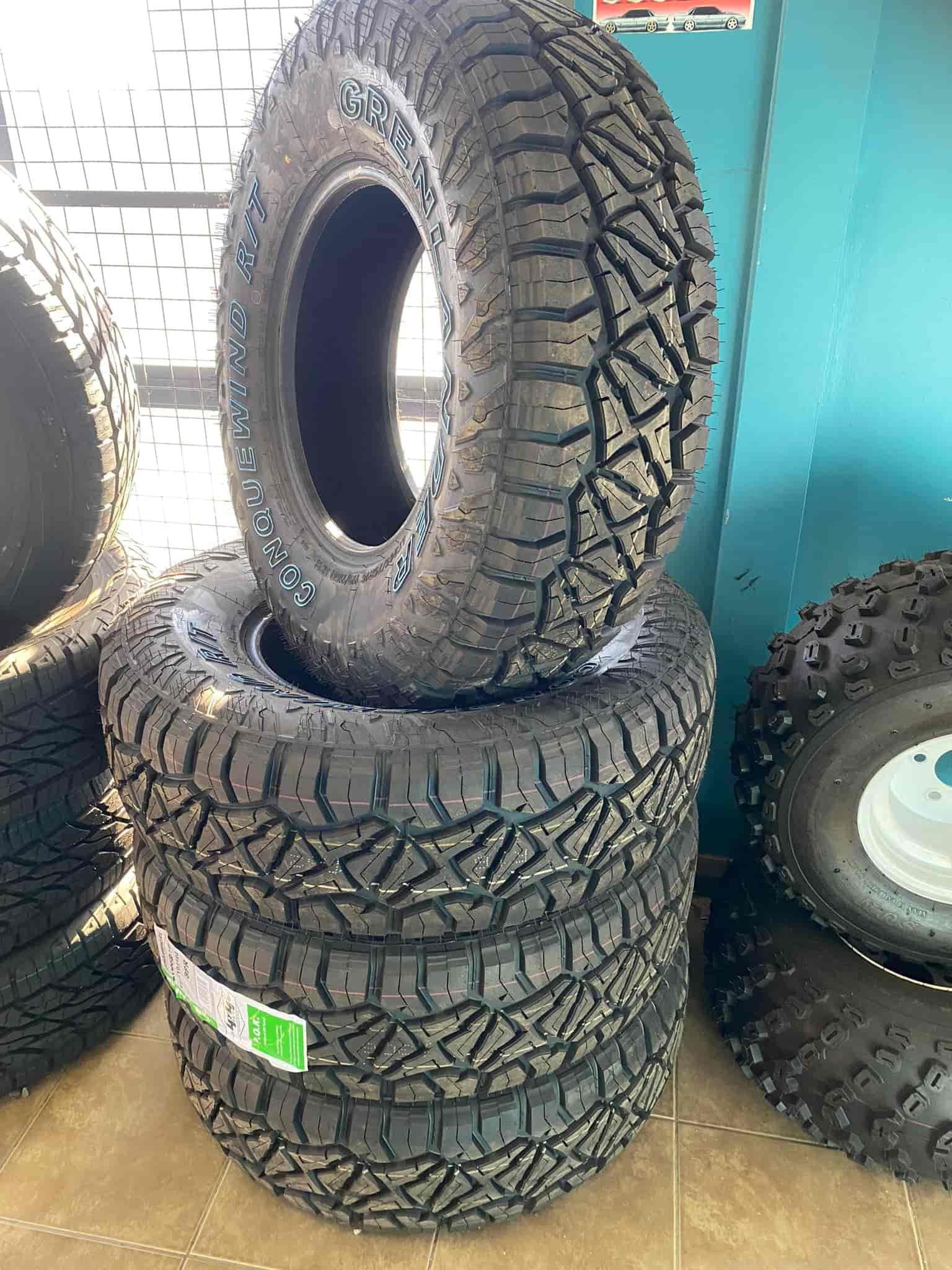 A Stack of Tyres Sitting on Top of Each Other on a Table — ARB Budget Tyres in Delacombe, VIC